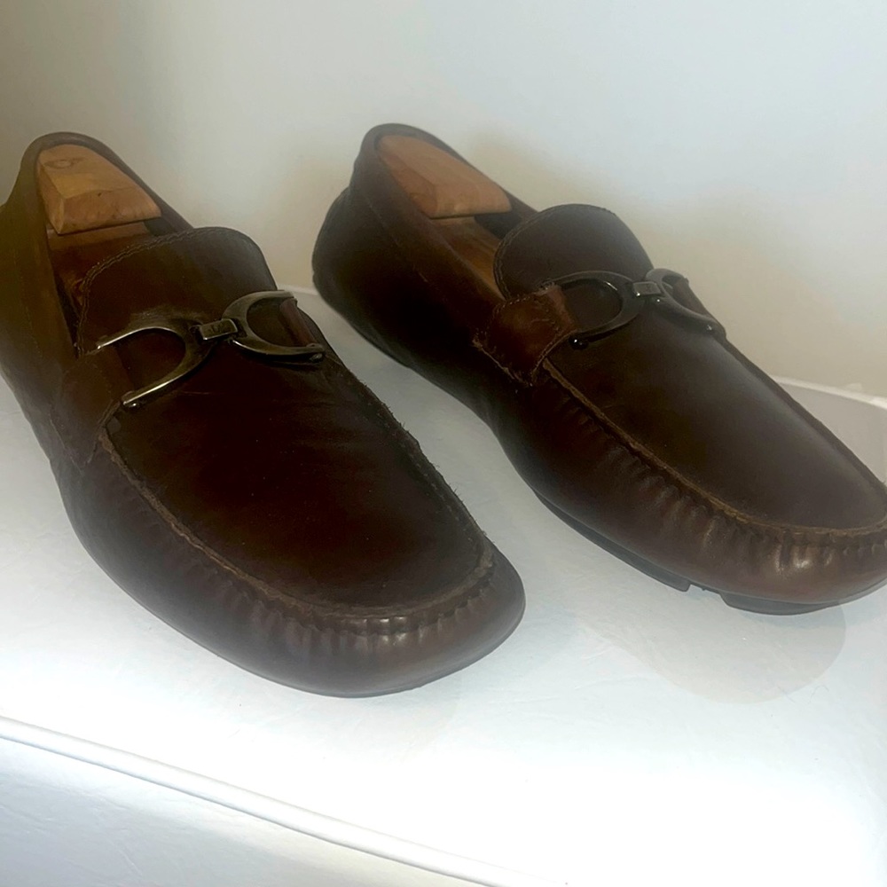 Donald Pliner brown leather loafers.